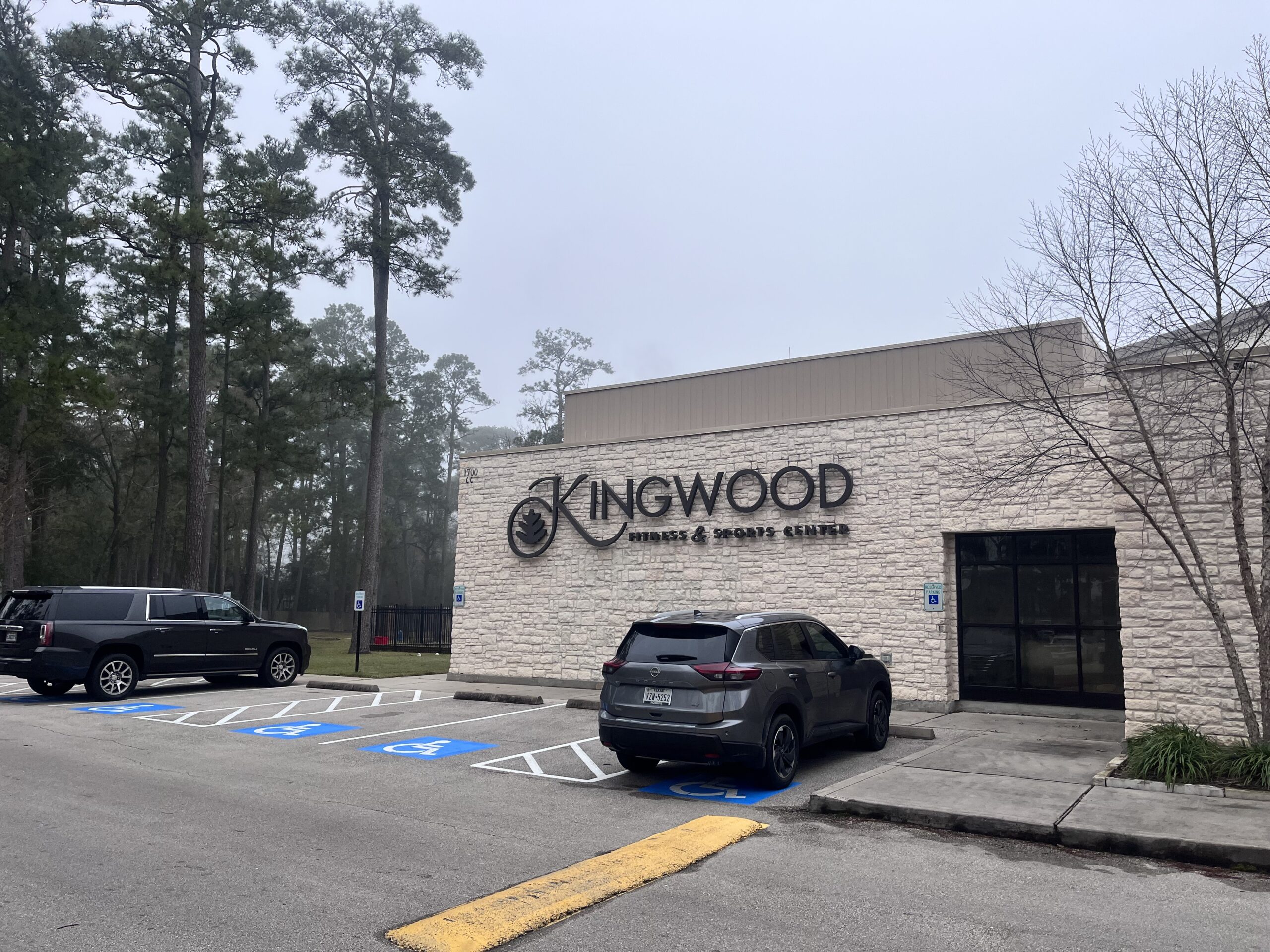 Exterior of the Clubs of Kingwood Fitness & Sports Center in Kingwood, Texas | Kingwood TX Homes for Sale | Red Hawk Property Team powered by JLA Realty