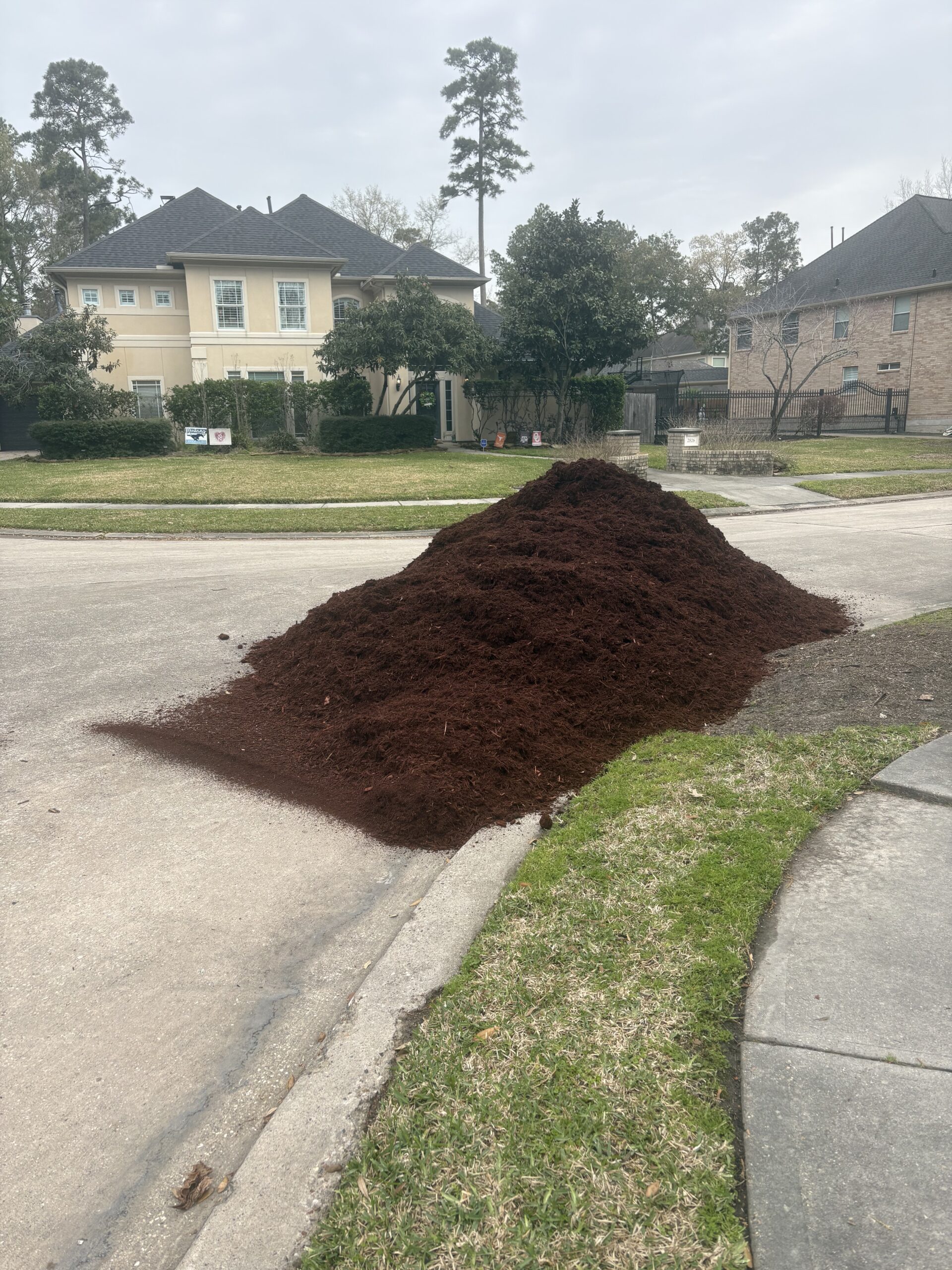 Kingwood Mulch & Stone Lawncare and Design Red Hawk Property Team JLA Realty Pile of Red Mulch Delivered to Our Home