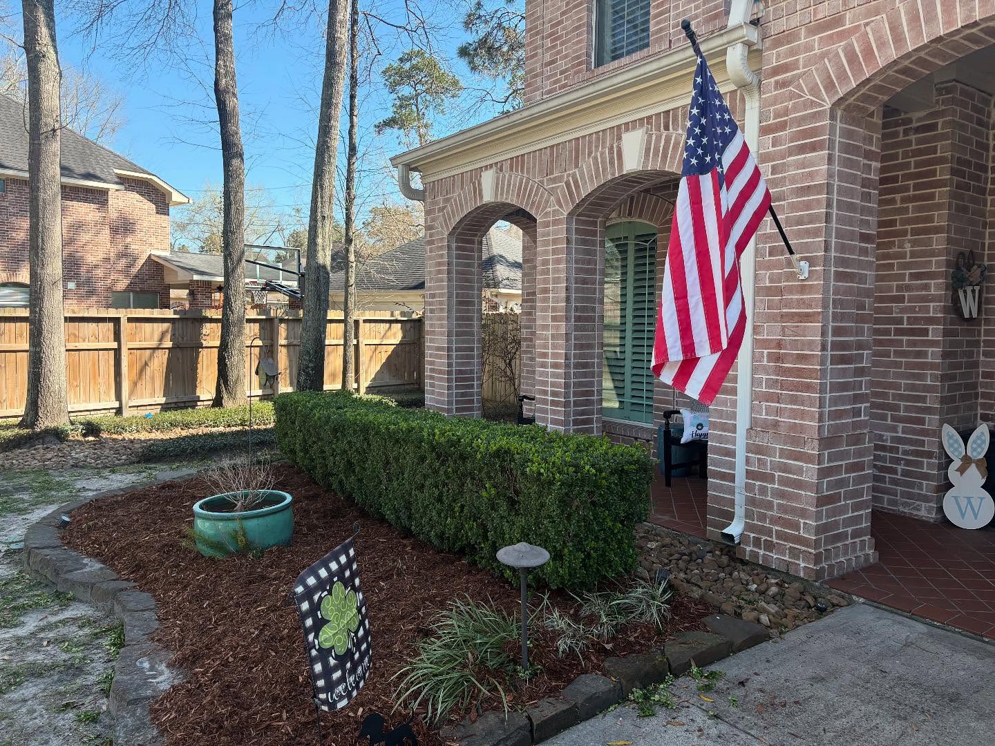 Red Hawk Property Team Leader Jeremy Williams Support KW Scouts Pine Bark Mulch Fundraiser an American Flag Wavies Proudly from His Home