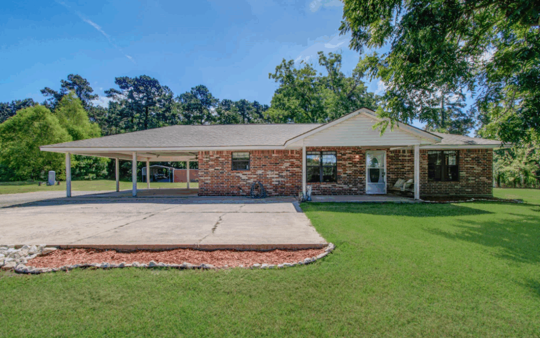 Homes Beyond Kingwood, TX: Peaceful 7-Acre Property with Pond and Workshop for Sale in Cleveland, TX